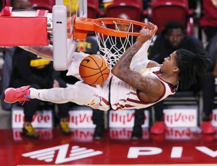 Iowa State Cyclones guard Keshon Gilbert (10) hangs in the basket after a dunk against Grambling State during the first half in the NCAA men's basketball at Hilton Coliseum on Sunday, Nov. 19, 2023, in Ames, Iowa.