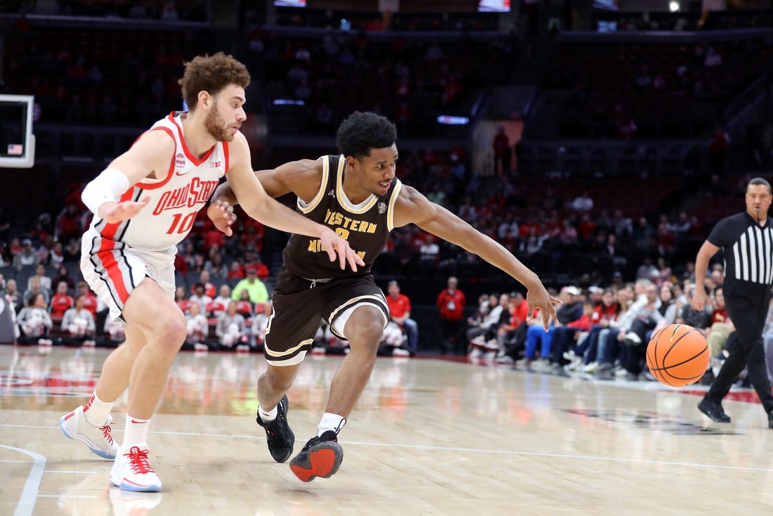 Nov 19, 2023; Columbus, Ohio, USA;  Western Michigan Broncos guard Jefferson De La Cruz Monegro (2) loses his dribble as Ohio State Buckeyes forward Jamison Battle (10) defends on the play during the first half at Value City Arena. Mandatory Credit: Joseph Maiorana-USA TODAY Sports