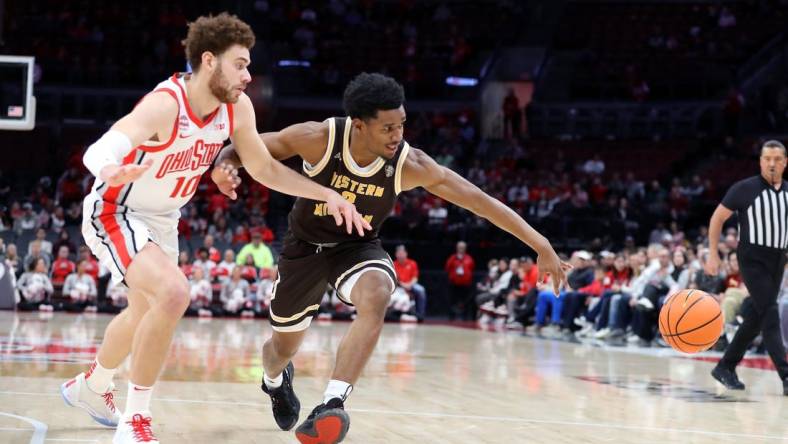 Nov 19, 2023; Columbus, Ohio, USA;  Western Michigan Broncos guard Jefferson De La Cruz Monegro (2) loses his dribble as Ohio State Buckeyes forward Jamison Battle (10) defends on the play during the first half at Value City Arena. Mandatory Credit: Joseph Maiorana-USA TODAY Sports