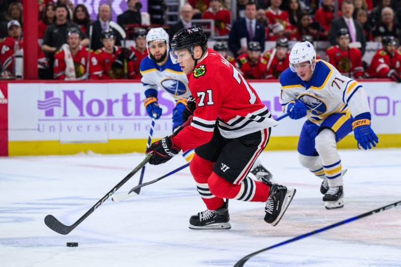 Nov 19, 2023; Chicago, Illinois, USA; Chicago Blackhawks left wing Taylor Hall (71) skates with the puck against the Buffalo Sabres during the first period at the United Center. Mandatory Credit: Daniel Bartel-USA TODAY Sports