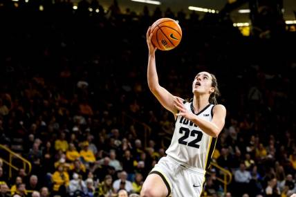 Iowa guard Caitlin Clark (22) drives to the basket during a NCAA women's basketball game against Drake, Sunday, Nov. 19, 2023, at Carver-Hawkeye Arena in Iowa City, Iowa.