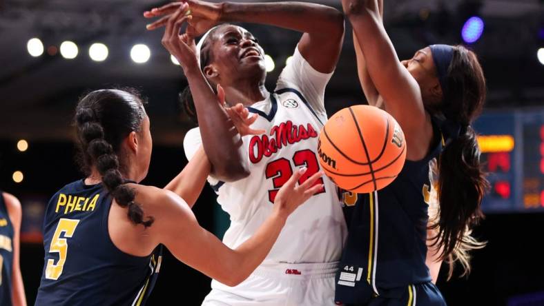 Ole Miss Rebels center Rita Igbokwe (32) goes up against Michigan Wolverines guard Laila Phelia (5) during the first half at Imperial Arena. Mandatory Credit: Kevin Jairaj-USA TODAY Sports