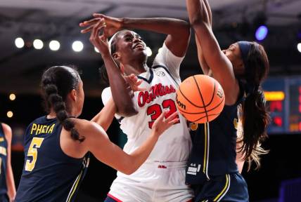 Ole Miss Rebels center Rita Igbokwe (32) goes up against Michigan Wolverines guard Laila Phelia (5) during the first half at Imperial Arena. Mandatory Credit: Kevin Jairaj-USA TODAY Sports