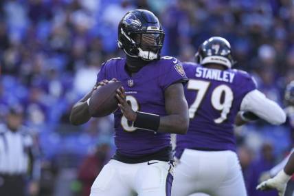 Nov 12, 2023; Baltimore, Maryland, USA;  Baltimore Ravens quarterback Lamar Jackson (8) passes the ball against the Cleveland Browns during the second half at M&T Bank Stadium. Mandatory Credit: Jessica Rapfogel-USA TODAY Sports