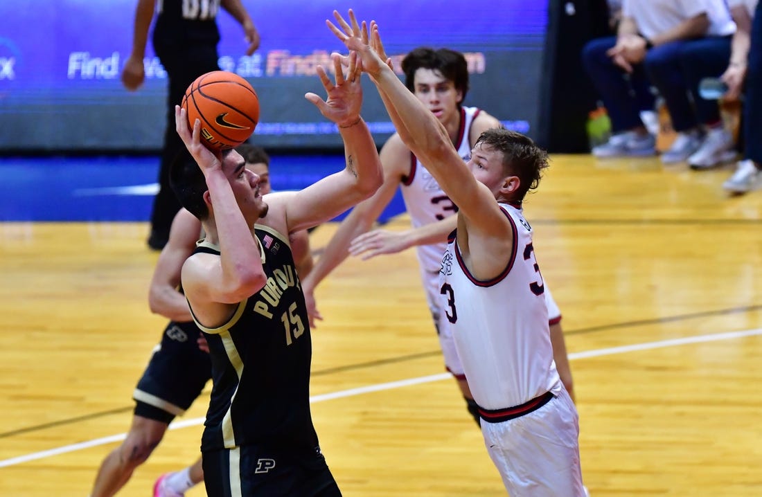 Nov 20, 2023; Honolulu, Hawaii, USA;  

Purdue Boilermakers center Zach Edey (15) shoots while being defended by Gonzaga Bulldogs forward Ben Gregg (33) during the first half at SimpliFi Arena at Stan Sheriff Center. Mandatory Credit: Steven Erler-USA TODAY Sports