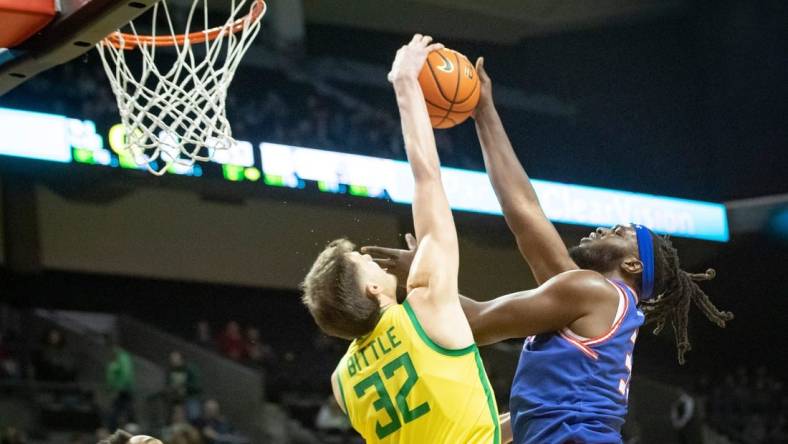 Oregon center Nate Bittle blocks a shot by Tennessee State forward Jason Jitoboh as the Oregon Ducks host Tennessee State Friday, Nov. 17, 2023, at Matthew Knight Arena in Eugene, Ore.