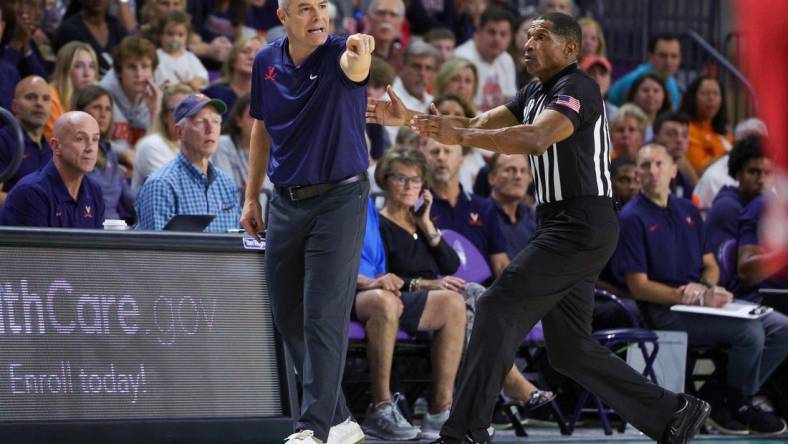 Nov 20, 2023; Fort Myers, Florida, USA;  Virginia Cavaliers head coach Tony Bennett reacts after a play against the Wisconsin Badgers in the first half during the Fort Myers Top-Off at Suncoast Credit Union Arena. Mandatory Credit: Nathan Ray Seebeck-USA TODAY Sports