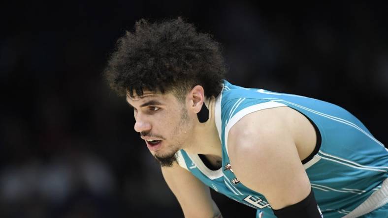 Nov 20, 2023; Charlotte, North Carolina, USA; Charlotte Hornets guard LaMelo Ball (1) in a time out during the first half against the Boston Celtics at the Spectrum Center. Mandatory Credit: Sam Sharpe-USA TODAY Sports