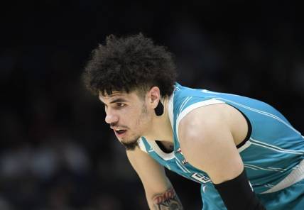 Nov 20, 2023; Charlotte, North Carolina, USA; Charlotte Hornets guard LaMelo Ball (1) in a time out during the first half against the Boston Celtics at the Spectrum Center. Mandatory Credit: Sam Sharpe-USA TODAY Sports