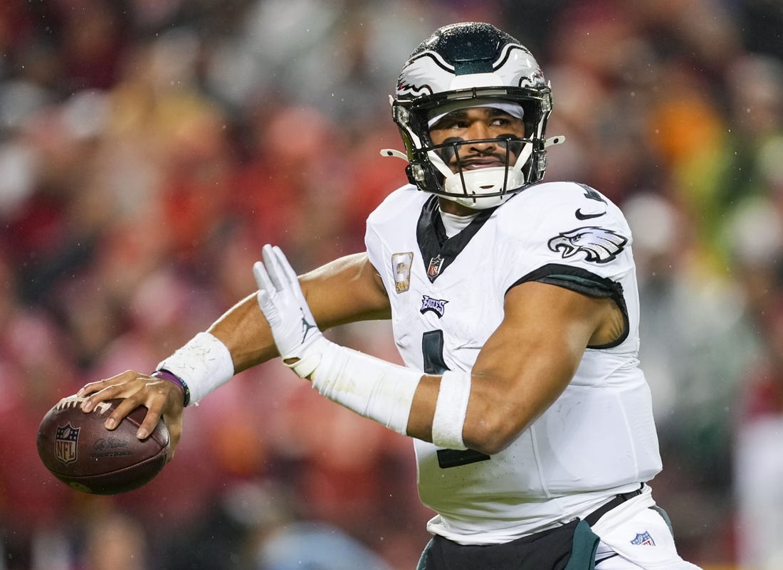 Nov 20, 2023; Kansas City, Missouri, USA; Philadelphia Eagles quarterback Jalen Hurts (1) throws a pass during the first half against the Kansas City Chiefs at GEHA Field at Arrowhead Stadium. Mandatory Credit: Jay Biggerstaff-USA TODAY Sports