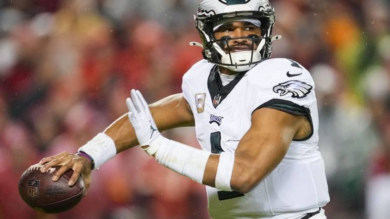 Nov 20, 2023; Kansas City, Missouri, USA; Philadelphia Eagles quarterback Jalen Hurts (1) throws a pass during the first half against the Kansas City Chiefs at GEHA Field at Arrowhead Stadium. Mandatory Credit: Jay Biggerstaff-USA TODAY Sports