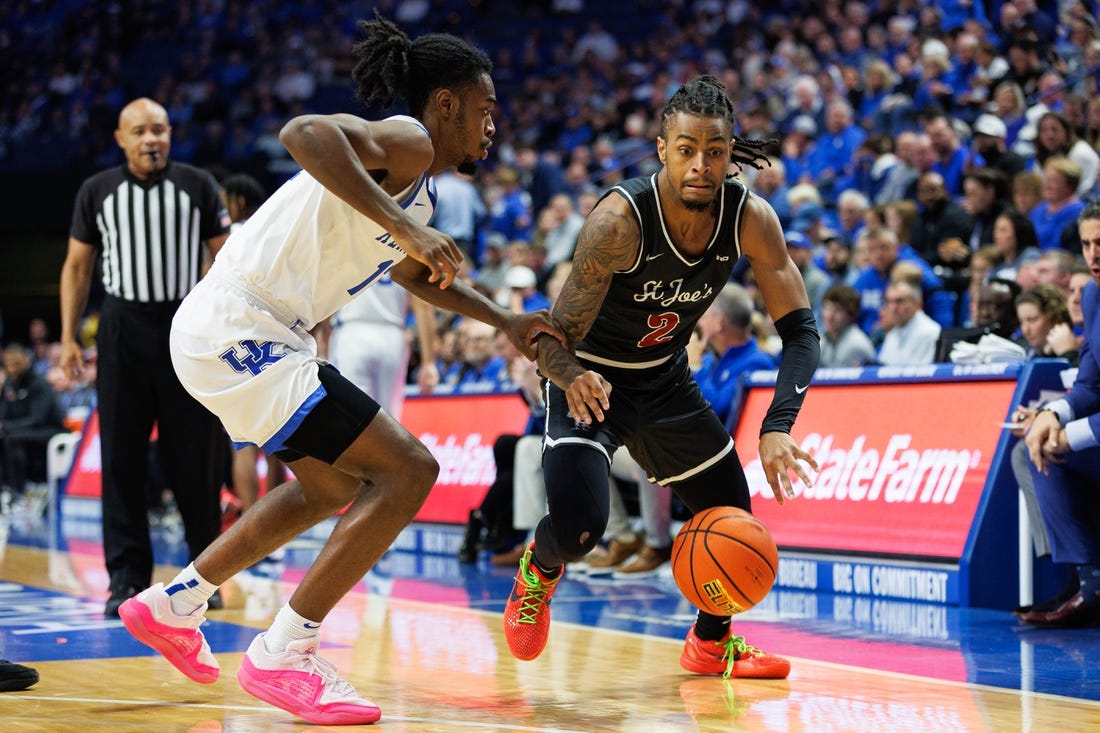 Nov 20, 2023; Lexington, Kentucky, USA; Saint Joseph's Hawks guard Erik Reynolds II (2) drives to the basket during the first half against the Kentucky Wildcats at Rupp Arena at Central Bank Center. Mandatory Credit: Jordan Prather-USA TODAY Sports