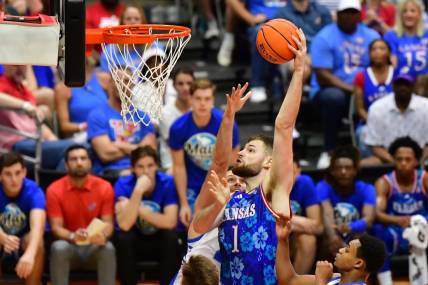 Nov 20, 2023; Honolulu, Hawaii, USA;  Kansas Jayhawks center Hunter Dickinson (1) shoots the ball during the second period against the Chaminade Silverswords 
at SimpliFi Arena at Stan Sheriff Center. Mandatory Credit: Steven Erler-USA TODAY Sports