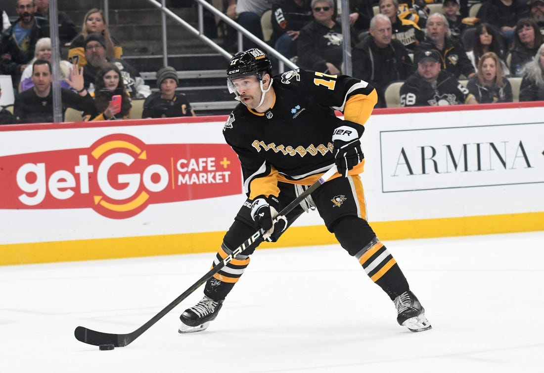 Nov 16, 2023; Pittsburgh, Pennsylvania, USA;  Pittsburgh Penguins right wing Bryan Rust (17) against the New Jersey Devils during the first period at PPG Paints Arena. Mandatory Credit: Philip G. Pavely-USA TODAY Sports