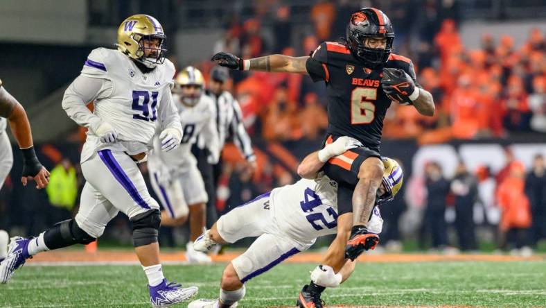 Nov 18, 2023; Corvallis, Oregon, USA; Oregon State Beavers running back Damien Martinez (6) runs the ball during the third quarter against the Washington Huskies at Reser Stadium. Mandatory Credit: Craig Strobeck-USA TODAY Sports