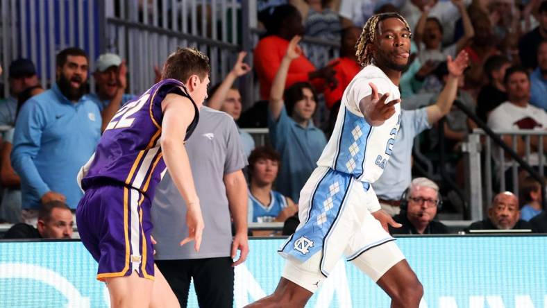 Nov 22, 2023; Paradise Island, BAHAMAS;  North Carolina Tar Heels forward Jae'Lyn Withers (24) reacts after scoring  over Northern Iowa Panthers forward Kyle Pock (22) during the first half at Imperial Arena. Mandatory Credit: Kevin Jairaj-USA TODAY Sports