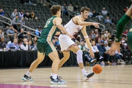 Nov 22, 2023; Kansas City, Missouri, USA; Boston College Eagles forward Quinten Post (12) looks to set the play during the first half against the Colorado State Rams at T-Mobile Center. Mandatory Credit: William Purnell-USA TODAY Sports