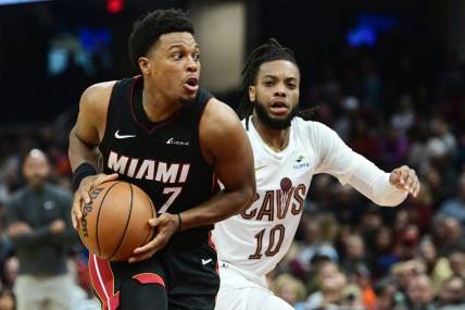 Nov 22, 2023; Cleveland, Ohio, USA; Miami Heat guard Kyle Lowry (7) drives to the basket against Cleveland Cavaliers guard Darius Garland (10) during the first half at Rocket Mortgage FieldHouse. Mandatory Credit: Ken Blaze-USA TODAY Sports