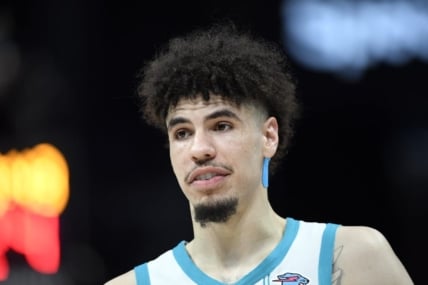 Nov 22, 2023; Charlotte, North Carolina, USA; Charlotte Hornets guard LaMelo Ball (1) looks on during a time out in the second half against the Washington Wizards at the Spectrum Center. Mandatory Credit: Sam Sharpe-USA TODAY Sports