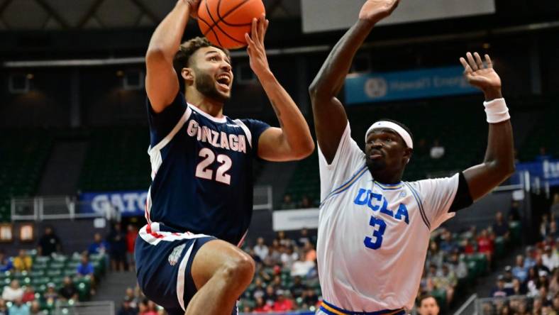 Nov 22, 2023; Honolulu, HI, USA; sGonzaga Bulldogs forward Anton Watson (22) shoots the ball defended by UCLA Bruins forward Adem Bona (3) during the first period at SimpliFi Arena at Stan Sheriff Center. Mandatory Credit: Steven Erler-USA TODAY Sports