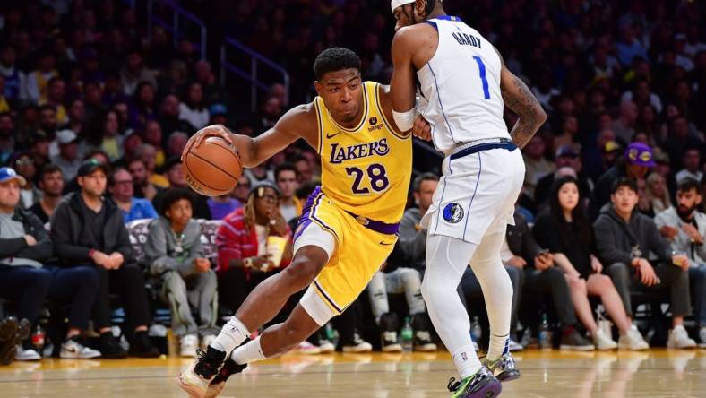 Nov 22, 2023; Los Angeles, California, USA; Los Angeles Lakers forward Rui Hachimura (28) moves to the basket against Dallas Mavericks guard Jaden Hardy (1) during the second half at Crypto.com Arena. Mandatory Credit: Gary A. Vasquez-USA TODAY Sports