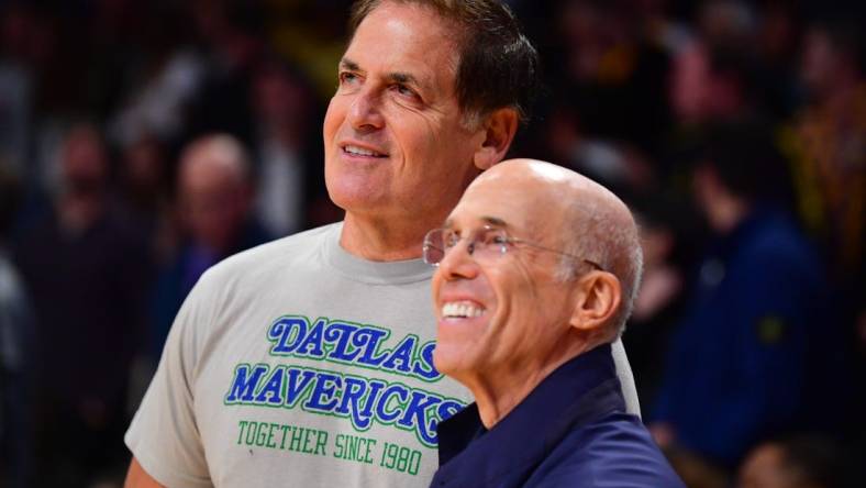 Nov 22, 2023; Los Angeles, California, USA; Dallas Mavericks owner Mark Cuban meets with media executive Jeffrey Katzenberg at Crypto.com Arena. Mandatory Credit: Gary A. Vasquez-USA TODAY Sports