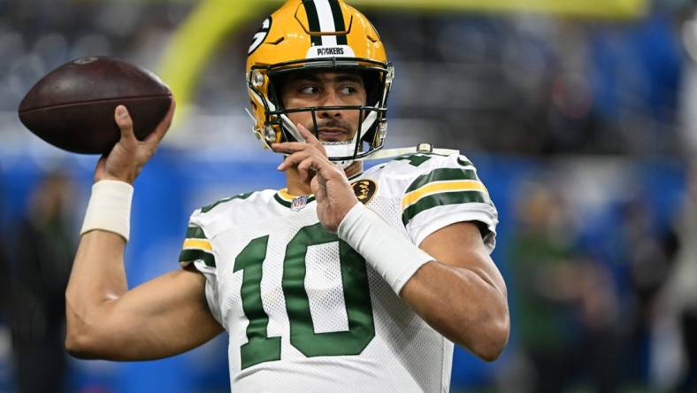 Nov 23, 2023; Detroit, Michigan, USA; Green Bay Packers quarterback Jordan Love (10) throws passes during pregame warmups before their game against the Detroit Lions at Ford Field. Mandatory Credit: Lon Horwedel-USA TODAY Sports