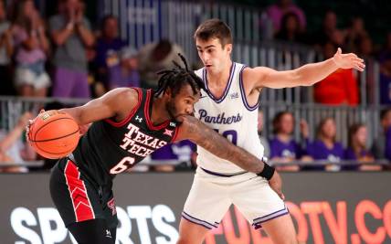Nov 23, 2023; Paradise Island, BAHAMAS;  Texas Tech Red Raiders guard Joe Toussaint (6) drives as Northern Iowa Panthers guard RJ Taylor (10) defends during the first half at Imperial Arena. Mandatory Credit: Kevin Jairaj-USA TODAY Sports