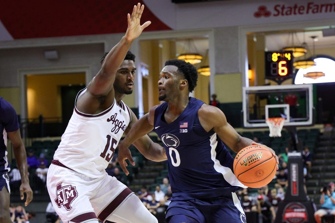 Nov 23, 2023; Kissimmee, FL, USA;  Penn State Nittany Lions guard Kanye Clary (0) drives to the hoop guarded by Texas A&M Aggies forward Henry Coleman III (15) in the first half during the ESPN Events Invitational at State Farm Field House. Mandatory Credit: Nathan Ray Seebeck-USA TODAY Sports