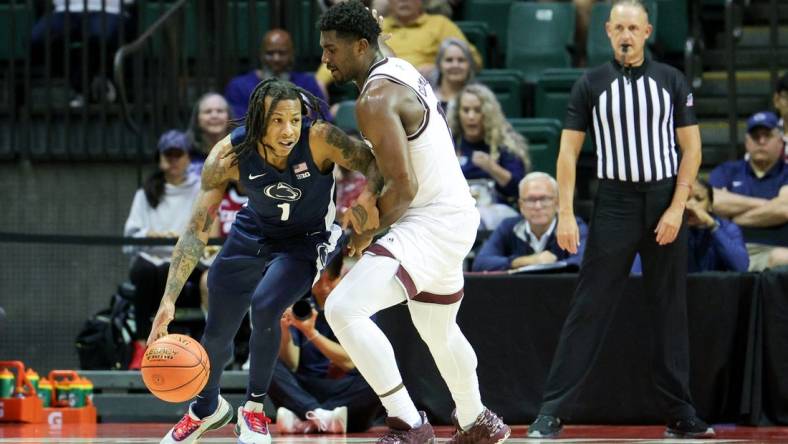 Nov 23, 2023; Kissimmee, FL, USA;  Texas A&M Aggies forward Henry Coleman III (15) guards Penn State Nittany Lions guard Ace Baldwin Jr. (1) in the second half during the ESPN Events Invitational at State Farm Field House. Mandatory Credit: Nathan Ray Seebeck-USA TODAY Sports