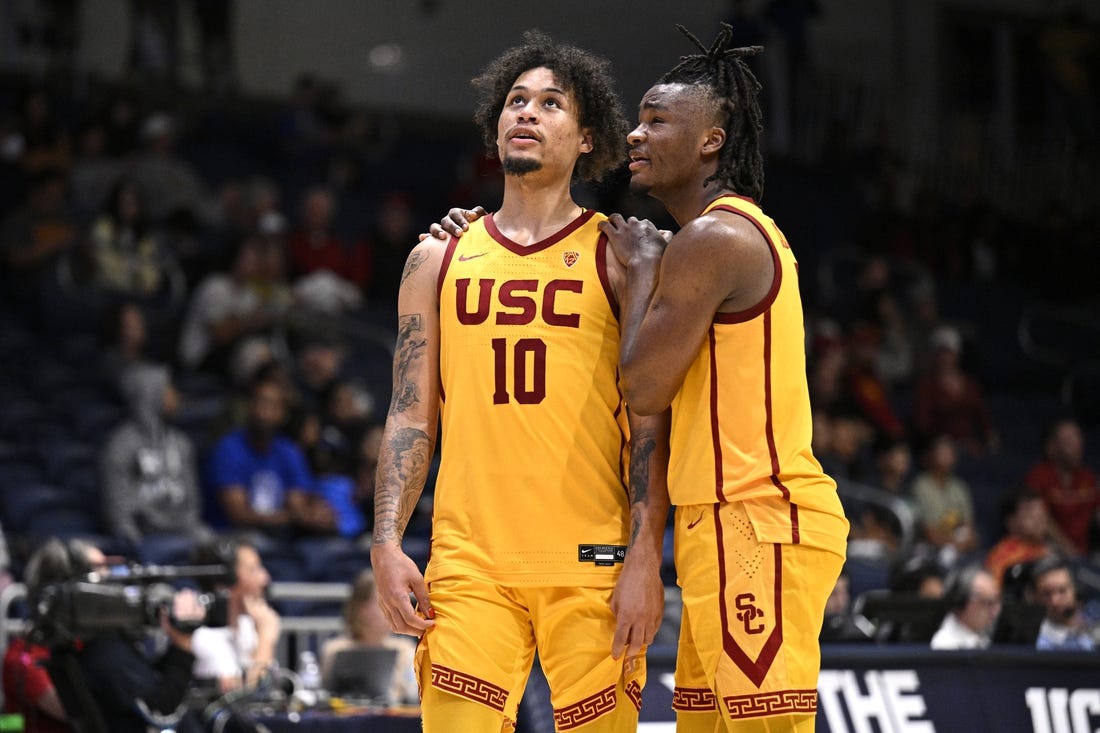 Nov 23, 2023; La Jolla, California, USA; USC Trojans forward DJ Rodman (10) and guard Isaiah Collier (1) embrace during the second half against the Seton Hall Pirates at LionTree Arena. Mandatory Credit: Orlando Ramirez-USA TODAY Sports