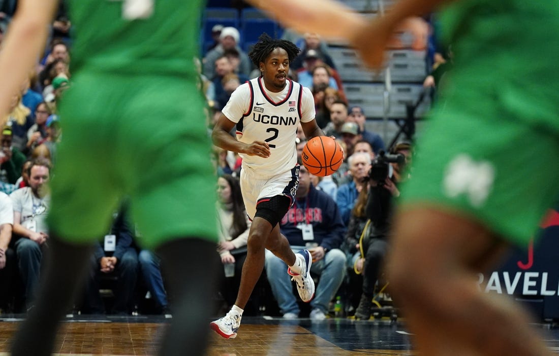 Nov 24, 2023; Hartford, Connecticut, USA; UConn Huskies guard Tristen Newton (2) returns the ball again st the Manhattan Jaspers in the first half at XL Center. Mandatory Credit: David Butler II-USA TODAY Sports