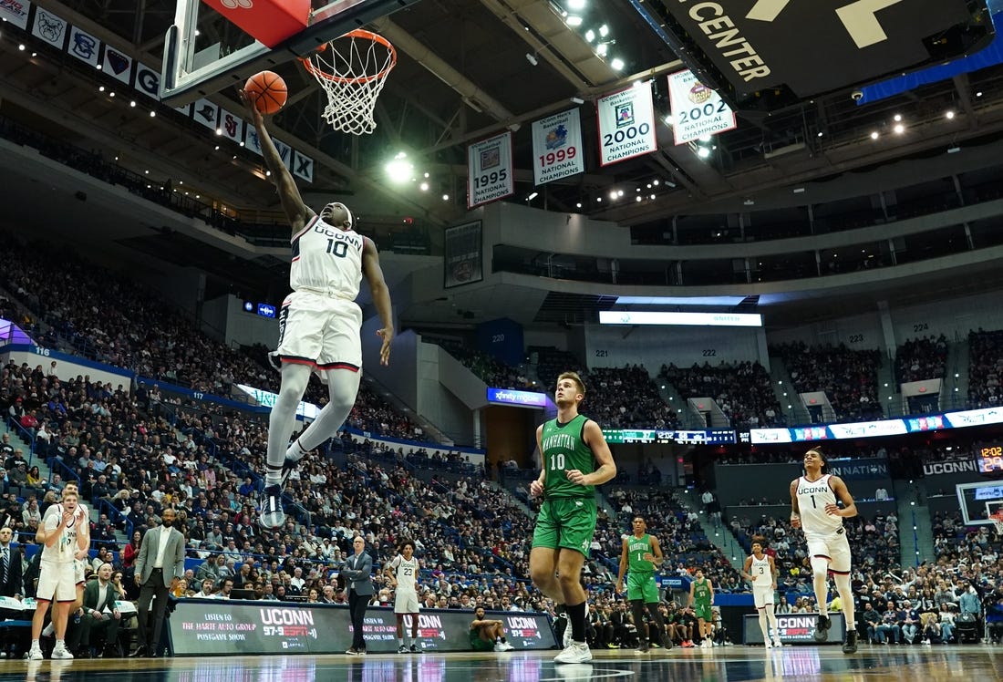 Nov 24, 2023; Hartford, Connecticut, USA; UConn Huskies guard Hassan Diarra (10) steals the ball and makes a basket against the Manhattan Jaspers in the second half at XL Center. Mandatory Credit: David Butler II-USA TODAY Sports