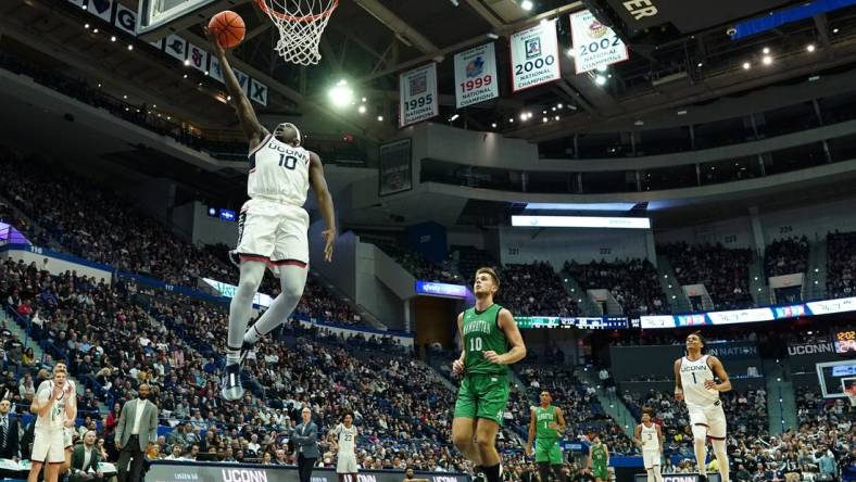 Nov 24, 2023; Hartford, Connecticut, USA; UConn Huskies guard Hassan Diarra (10) steals the ball and makes a basket against the Manhattan Jaspers in the second half at XL Center. Mandatory Credit: David Butler II-USA TODAY Sports