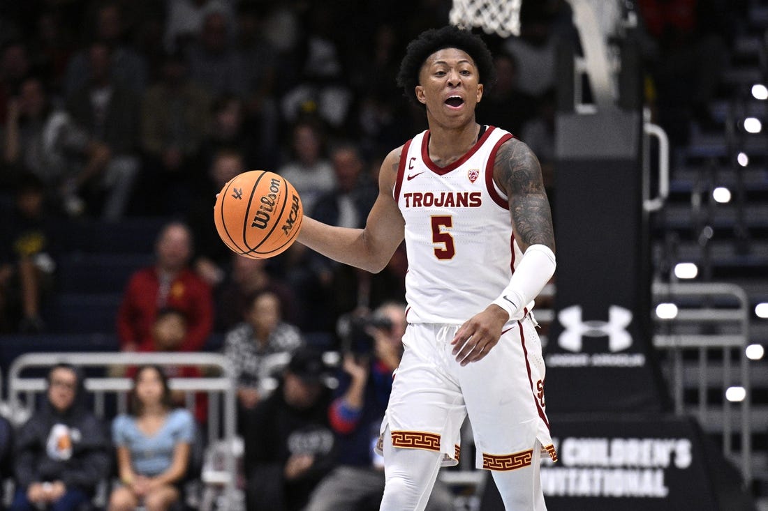 Nov 24, 2023; La Jolla, California, USA; USC Trojans guard Boogie Ellis (5) dribbles the ball during the first half against the Oklahoma Sooners at LionTree Arena. Mandatory Credit: Orlando Ramirez-USA TODAY Sports