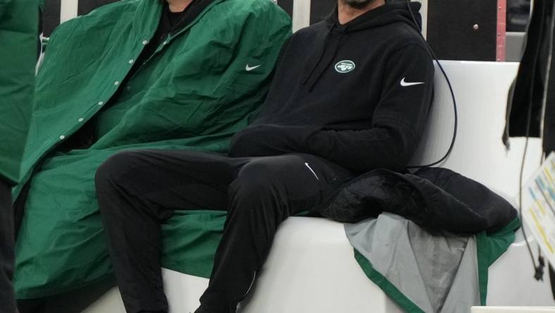 East Rutherford, NJ     November 24, 2023 -- Zach Wilson and Aaron Rodgers of the Jets in the first half as the Miami Dolphins defeated the NY Jets 34-13 at MetLife Stadium on November 24, 2023 in East Rutherford, NJ to play in the first    Black Friday    NFL game.