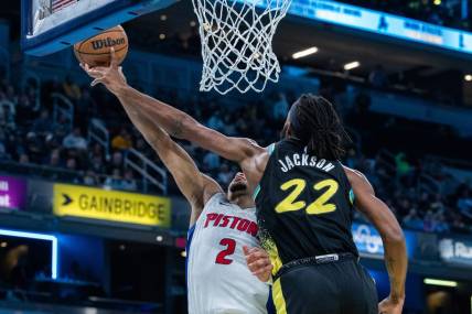 Nov 24, 2023; Indianapolis, Indiana, USA; Indiana Pacers forward Isaiah Jackson (22) blocks the shot of Detroit Pistons guard Cade Cunningham (2) in the first half at Gainbridge Fieldhouse. Mandatory Credit: Trevor Ruszkowski-USA TODAY Sports