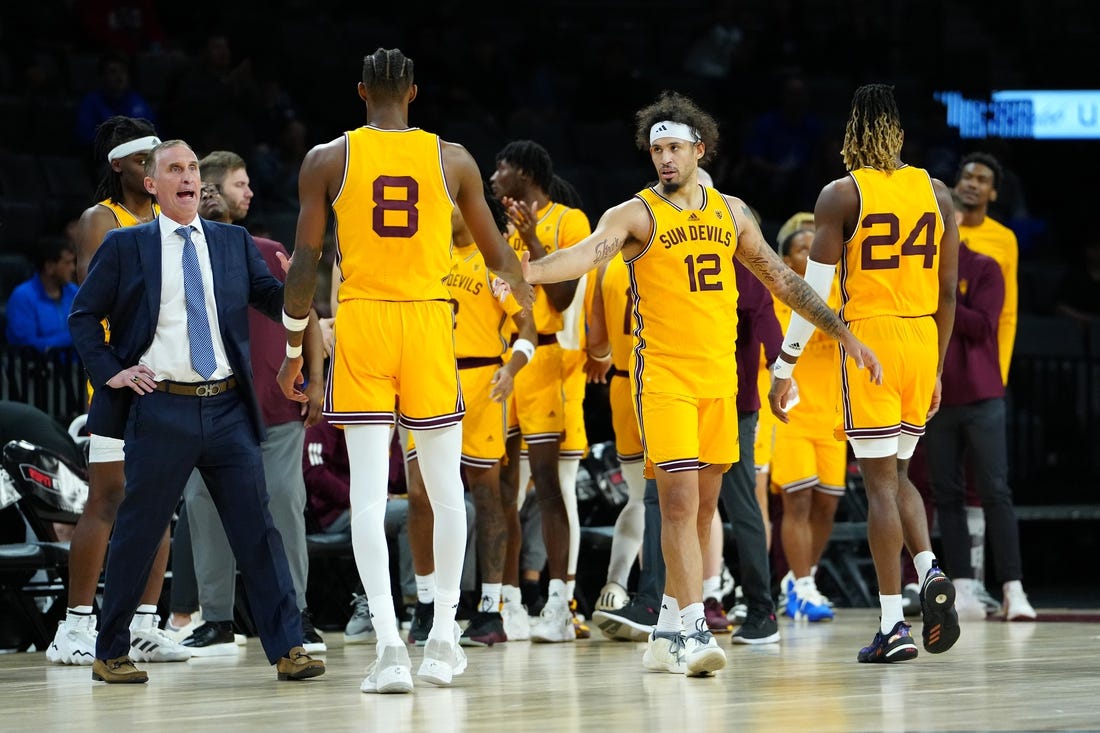 Nov 24, 2023; Las Vegas, NV, USA; Arizona State Sun Devils guard Jose Perez (12) congratulates Arizona State Sun Devils forward Alonzo Gaffney (8) after the Sun Devils defeated the Vanderbilt Commodores 82-67 at Michelob ULTRA Arena. Mandatory Credit: Stephen R. Sylvanie-USA TODAY Sports