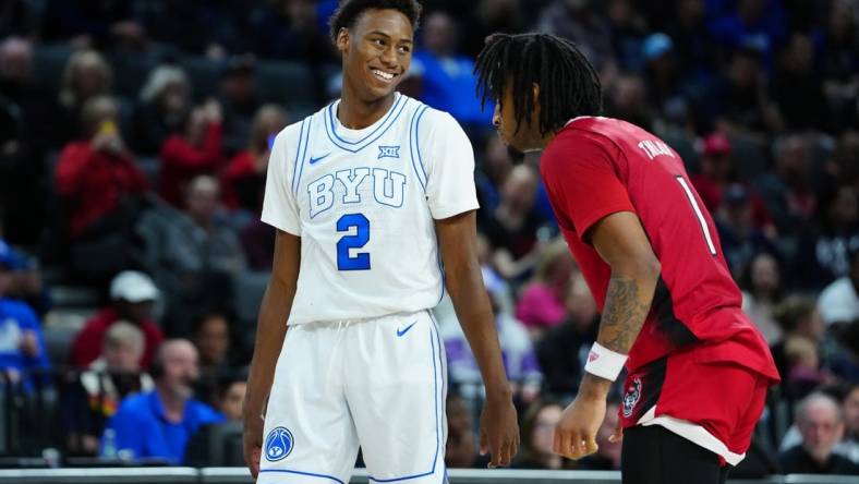 Nov 24, 2023; Las Vegas, NV, USA; Brigham Young Cougars guard Jaxson Robinson (2) and North Carolina State Wolfpack guard Jayden Taylor (1) await an inbounds play during the second half at Michelob ULTRA Arena. Mandatory Credit: Stephen R. Sylvanie-USA TODAY Sports