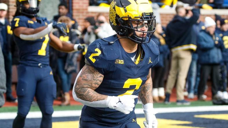 Michigan running back Blake Corum warms up before the Ohio State game at Michigan Stadium in Ann Arbor on Saturday, Nov. 25, 2023.