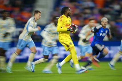 Nov 25, 2023; Cincinnati, Ohio, USA; Philadelphia Union goalkeeper Andre Blake (18) controls the ball against FC Cincinnati in the first half in a MLS Cup Eastern Conference Semifinal match at TQL Stadium. Mandatory Credit: Aaron Doster-USA TODAY Sports