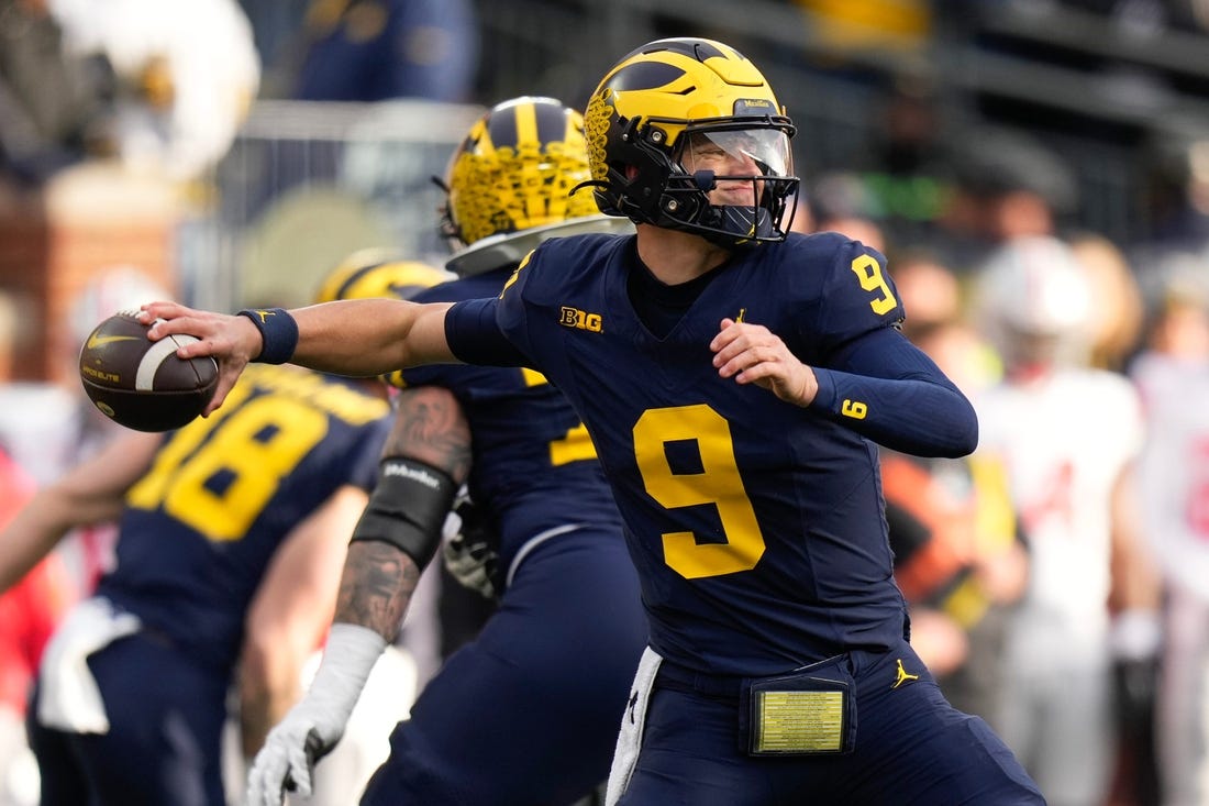 Nov 25, 2023; Ann Arbor, Michigan, USA; Michigan Wolverines quarterback J.J. McCarthy (9) throws during the second half of the NCAA football game against the Ohio State Buckeyes at Michigan Stadium. Ohio State lost 30-24.