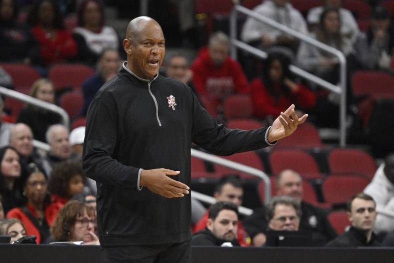 Nov 26, 2023; Louisville, Kentucky, USA; Louisville Cardinals head coach Kenny Payne coaches during the first half against the New Mexico State Aggies at KFC Yum! Center. Mandatory Credit: Jamie Rhodes-USA TODAY Sports