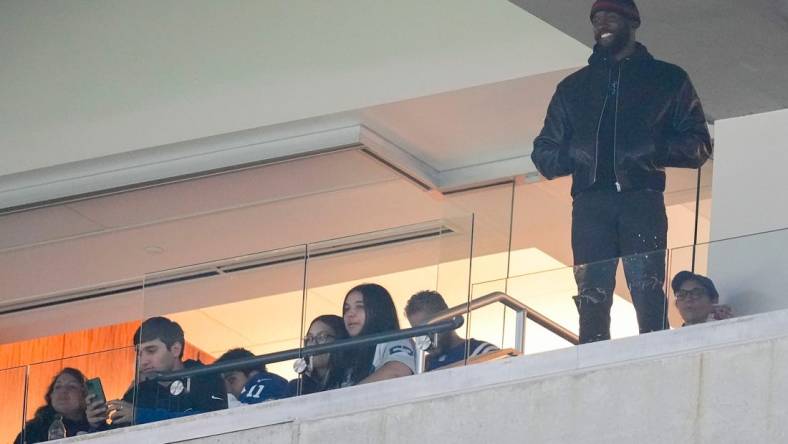 Former Indianapolis Colts linebacker Shaquille Leonard watches the game from a suite Sunday, Nov. 26, 2023, during a game against the Tampa Bay Buccaneers at Lucas Oil Stadium in Indianapolis.