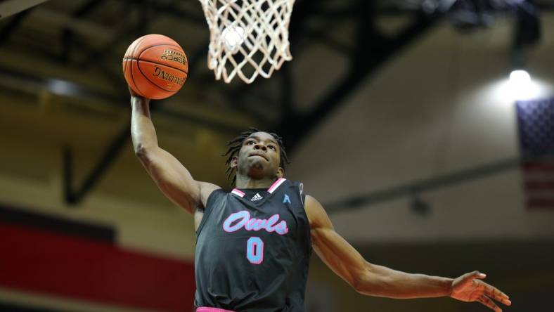 Nov 26, 2023; Kissimmee, FL, USA;  Florida Atlantic Owls forward Brenen Lorient (0) dunks the ball against the Virginia Tech Hokies in the second half during the ESPN Events Invitational Championship game at State Farm Field House. Mandatory Credit: Nathan Ray Seebeck-USA TODAY Sports