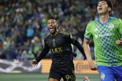 Nov 26, 2023; Seattle, Washington, USA; Los Angeles FC forward Denis Bouanga (99) reacts after scoring during the first half of a MLS Cup Western Conference Semifinal match against the Seattle Sounders at Lumen Field. Mandatory Credit: Joe Nicholson-USA TODAY Sports