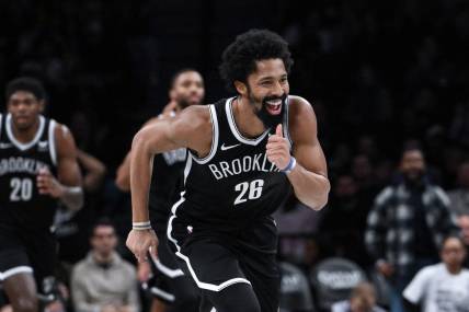 Nov 26, 2023; Brooklyn, New York, USA; Brooklyn Nets guard Spencer Dinwiddie (26) reacts after scoring a basket against the Chicago Bulls during the fourth quarter at Barclays Center. Mandatory Credit: John Jones-USA TODAY Sports