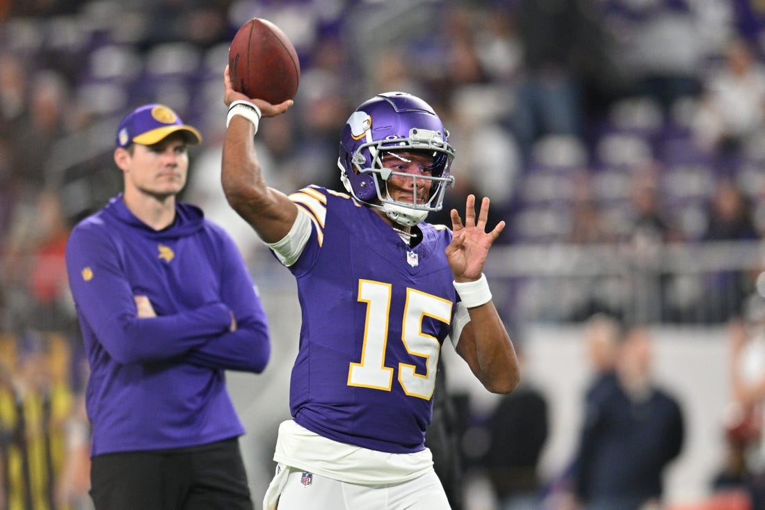 Nov 27, 2023; Minneapolis, Minnesota, USA; Minnesota Vikings quarterback Joshua Dobbs (15) warms up before the game between the Minnesota Vikings and the Chicago Bears at U.S. Bank Stadium. Mandatory Credit: Jeffrey Becker-USA TODAY Sports