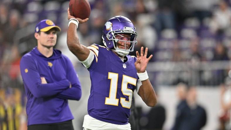 Nov 27, 2023; Minneapolis, Minnesota, USA; Minnesota Vikings quarterback Joshua Dobbs (15) warms up before the game between the Minnesota Vikings and the Chicago Bears at U.S. Bank Stadium. Mandatory Credit: Jeffrey Becker-USA TODAY Sports