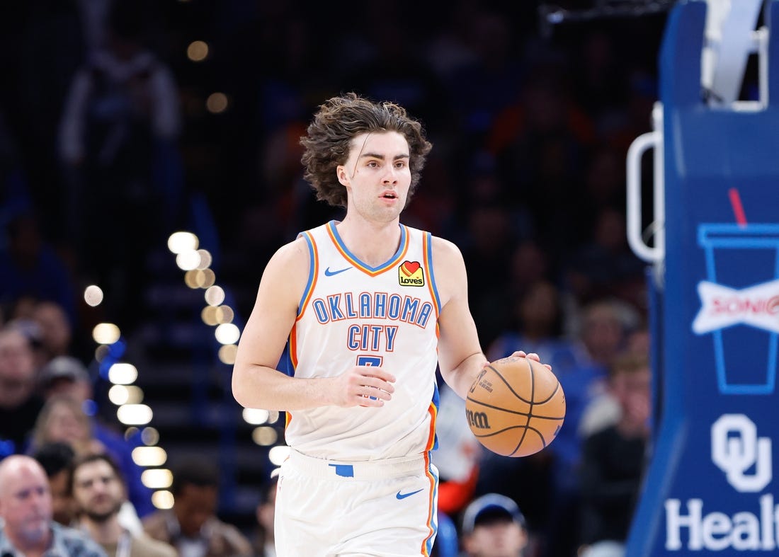 Nov 25, 2023; Oklahoma City, Oklahoma, USA; Oklahoma City Thunder guard Josh Giddey (3) dribbles the ball up the court against the Philadelphia 76ers during the second half at Paycom Center. Mandatory Credit: Alonzo Adams-USA TODAY Sports